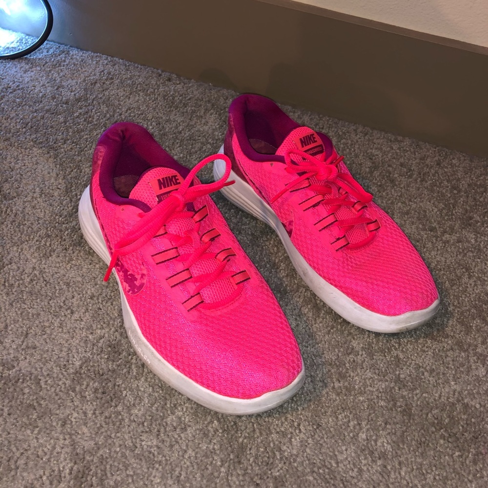 Pink nike running shoes
